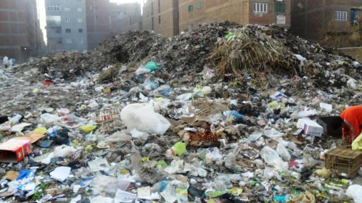 Dirty Egypt's piles of rubbish: Morsi offers garbage disposal solutions