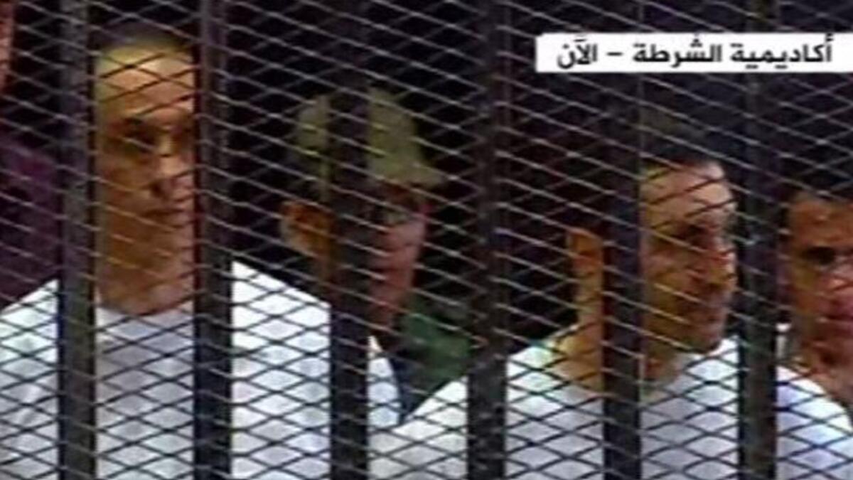 His accused kids could not pull off any extra frills to their prison-jumpsuits. Not Guantanamo Orange, but the more drab and
clinical 
white. The sons face corruption charges.