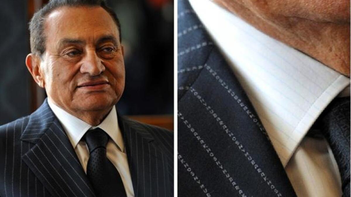 From Savile Row to (desired verdict by some) Death Row?? Once, not so long ago, Mubarak mindful of his
sartorial image to the 'fine-print', ordered his name stitched into the pinstripes of his suits. Signature bespoke suits, betray a dash of meglomania,
given the cost in time and money for the intricate weaving required by the tailor.
