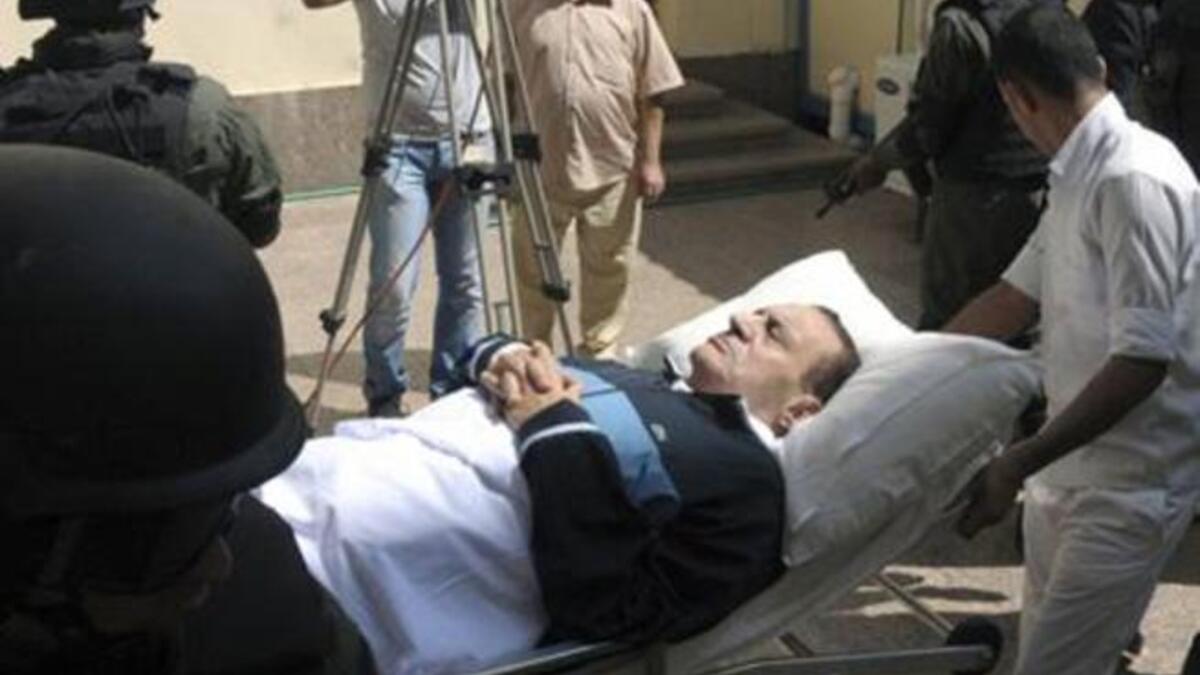 3rd outing: He was trying for a stiffer collared navy-colored austere look that might embolden him or allow him more 
gravitas once again.  Not quite the style he pulled off once-upon-a-time in those presidential days. See next...