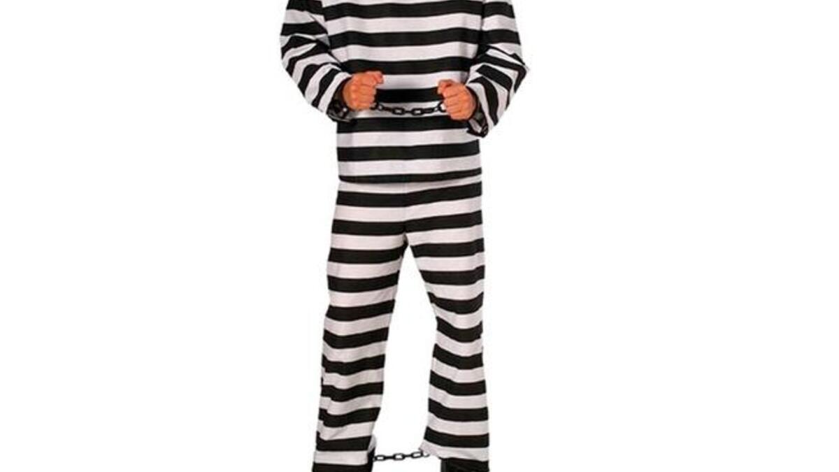 Oh how the mighty do fall and land flat on their backs: Times have been better for Mubarak, as right now we're more likely to see him clad in this typical convict get-up, characteristic
prison-striped uniform than in his former pin-'striped' signature-tailored suit-- See next...