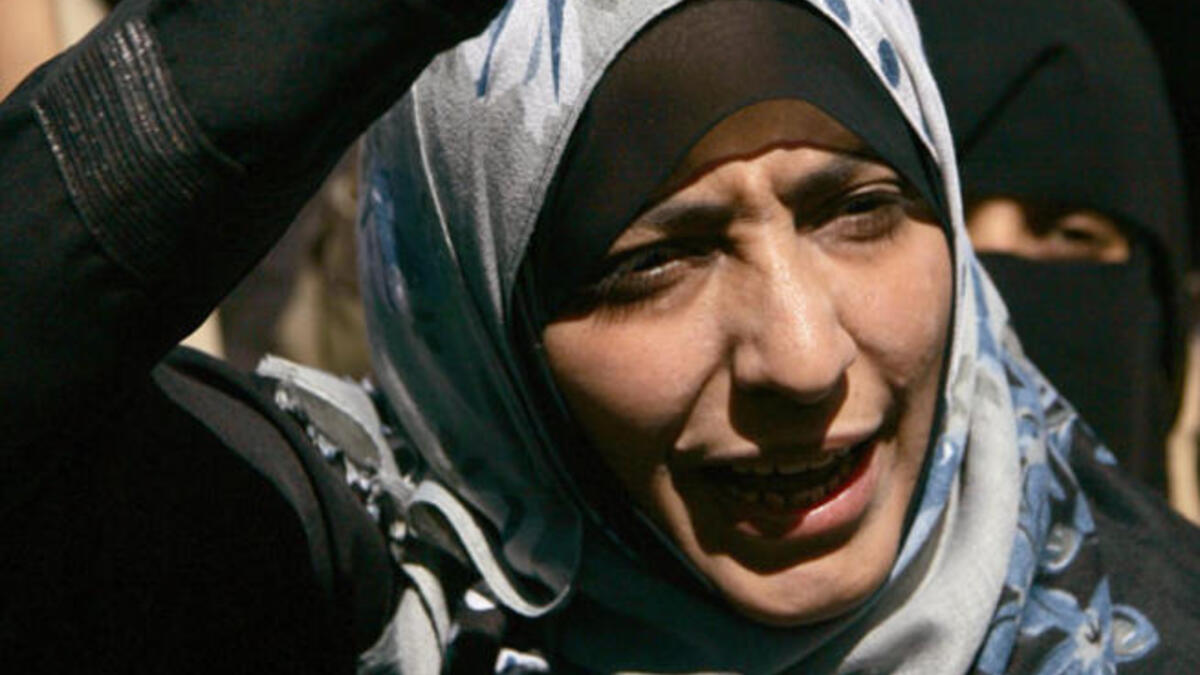 Tawakkul Karman- Yemen's revolutionary extraordinaire rose to public acclaim for her contributions to
both Arab women-kind and the Arab Spring. While sharing the Nobel Peace Prize with 3 women, this didn't 
diminish the scale of the victory for a buzzing Arab population - proud for one of theirs to join the select space
of 12 females before her.