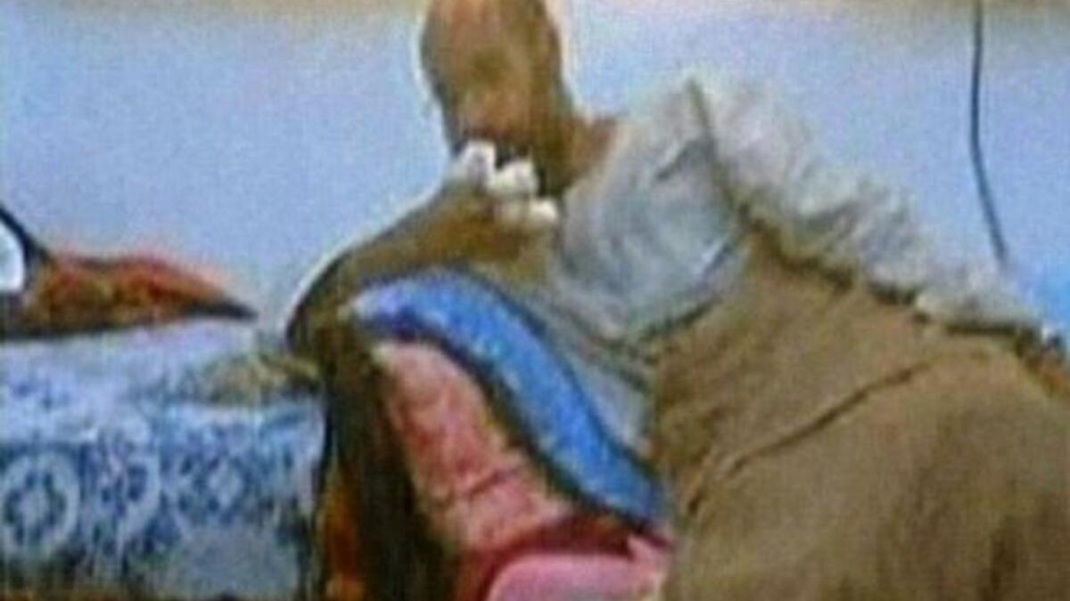 November 19, 2011 and Saif al-Islam, the fugitive son of ousted Libyan leader Muammar Gaddafi, captured on camera as well as in life, after his arrest in the south by the National Transitional Council (NTC). Gaddafi Junior, flown north, said on the plane that he was well and that injuries on his hand were caused by a Nato air strike a month ago.