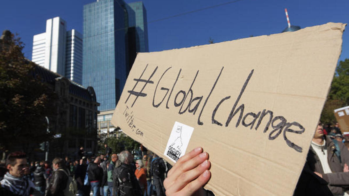 "Global change": This was the rallying cry for much of the Globe this weekend passed.  Speakers such as Ronald Regan, the 
former actor-President of the US participated. Most fittingly, the Marxist, en-vogue, philosopher-dissident Slavoj Žižek
gave an inspiring address to a world ripe for an alternative system. One that rejected Capitalism.