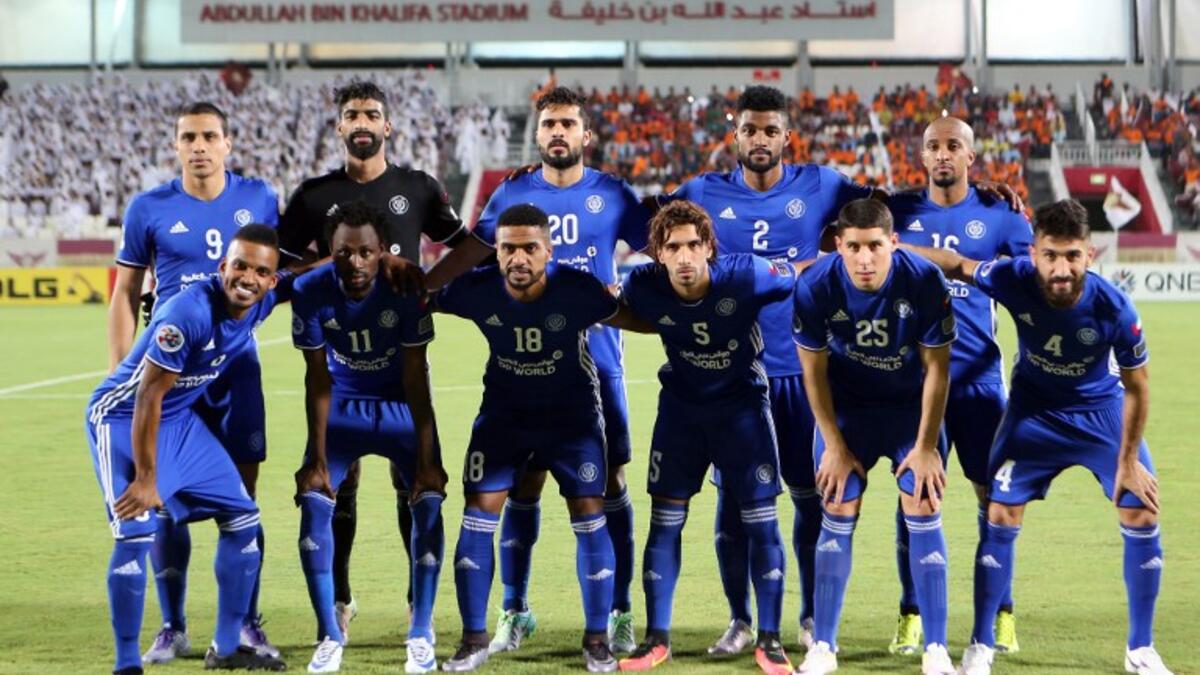 Al-Nasr's starting eleven pose for a group picture during the Asian Champions League quarter-final football match between Qatar's El-Jaish and UAE's Al-Nasr at Abdullah Bin Khalifa Stadium in Doha on August 24, 2016.

KARIM JAAFAR / AFP