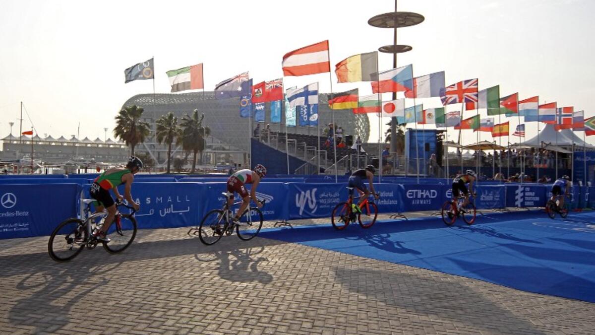 Athletes compete in the ITU World Triathlon at the Yas Marina Circuit in Abu Dhabi on March 4, 2017.
NEZAR BALOUT / AFP