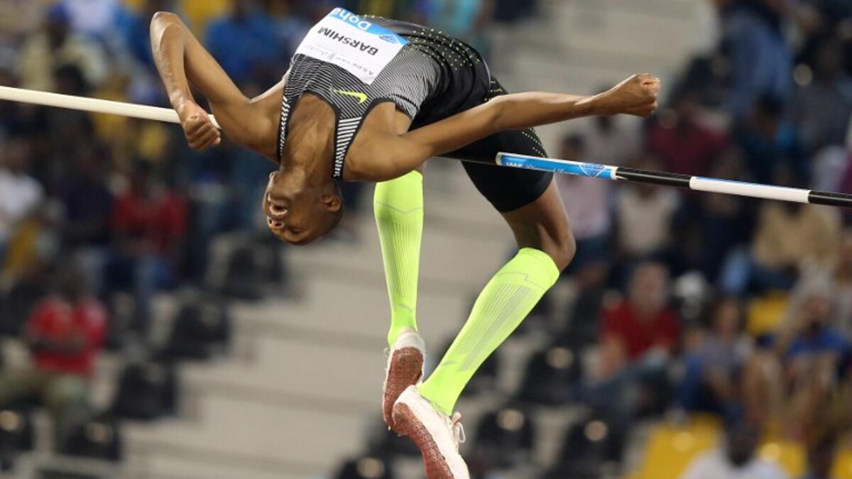 Qatar's Mutaz Essa Barshim competes in the High Jump final event at the Diamond League athletics meeting at the Suhaim bin Hamad Stadium in Doha on May 6, 2016.
KARIM JAAFAR / AFP