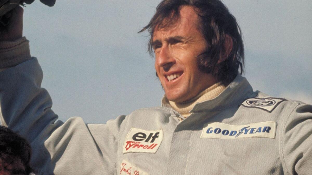 السائق البريطاني جاكي ستيوارت بثلاثة ألقاب أعوام 1969 و 1971 و 1973.