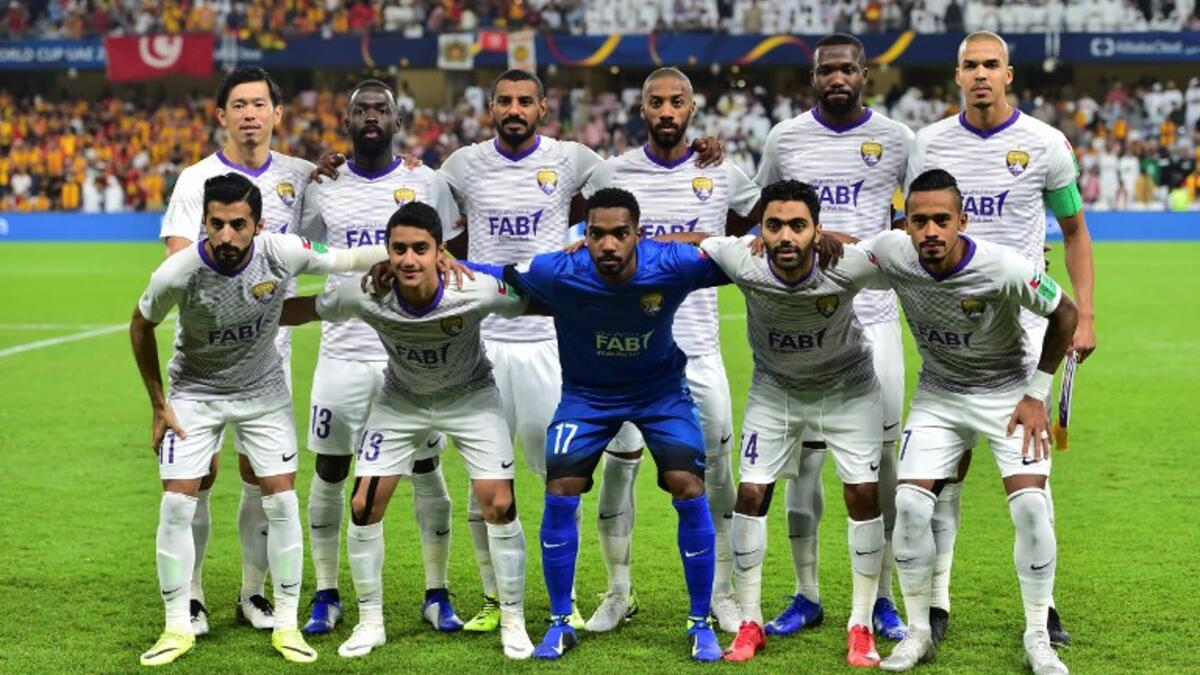 Al Ain's players pose for a photograph prior to the second round match of the FIFA Club World Cup 2018 football tournament against Tunisia's Esperance Tunis at the Hazza Bin Zayed Stadium in Abu Dhabi, United Arab Emirates, on December 15, 2018.
GIUSEPPE CACACE / AFP