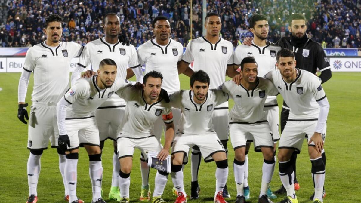 Qatar's Al-Sadd starting eleven pose for a team photo prior to their AFC Champions League playoff football match against Iran's Esteghlal club at the Azadi stadium in Tehran on February 7, 2017.
ATTA KENARE / AFP