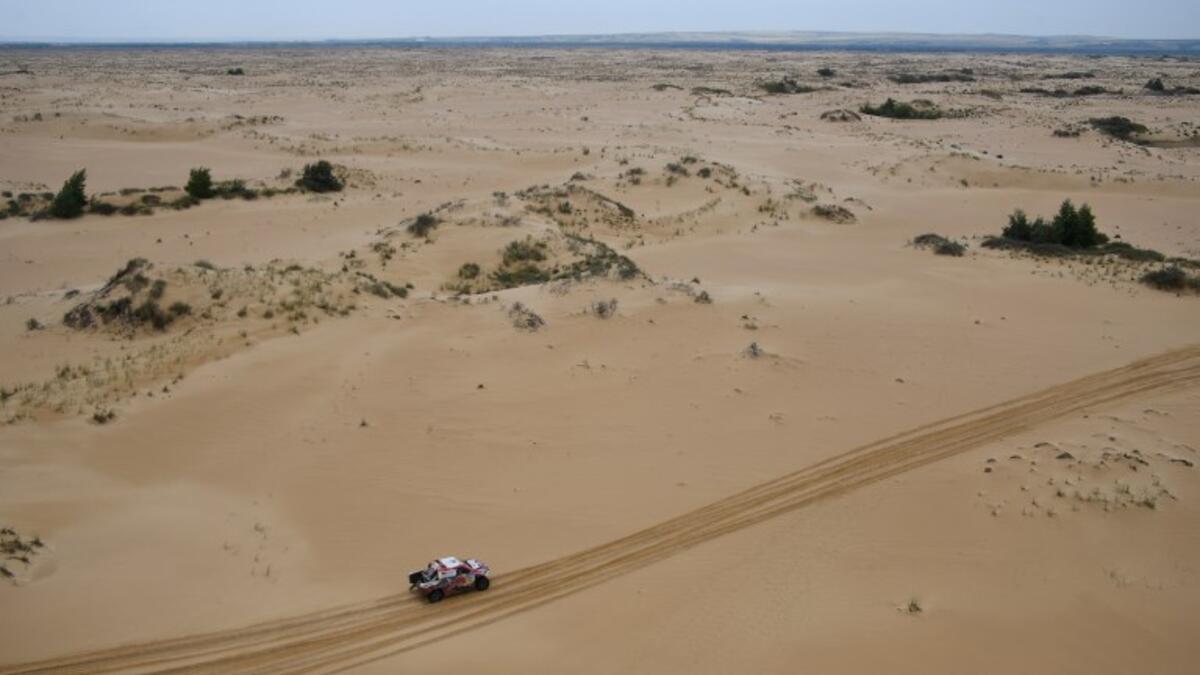 Toyota Hilux Qatar pilot Nasser al-Attiya and France Co-pilot Mathieu Baumel compete during the second to last leg of the Silk Way Rally 2018 Volgograd-Lipetsk on July 26, 2018.
DAMIEN MEYER / AFP