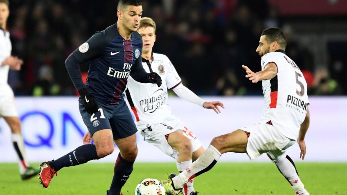 Paris Saint-Germain's French forward Hatem Ben Arfa (L) vies Nice's Morocco striker Younès Belhanda during the French L1 football match between Paris Saint-Germain and Nice at the Parc des Princes stadium in Paris on Deecmber 11, 2016. A
MIGUEL MEDINA / AFP