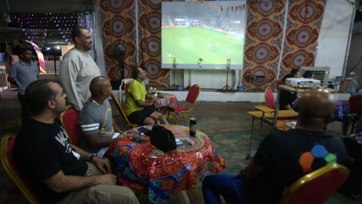 Egyptians watch a football match of the Euro 2016 on June 20, 2016 in the Omani capital Muscat.
MOHAMMED MAHJOUB / AFP