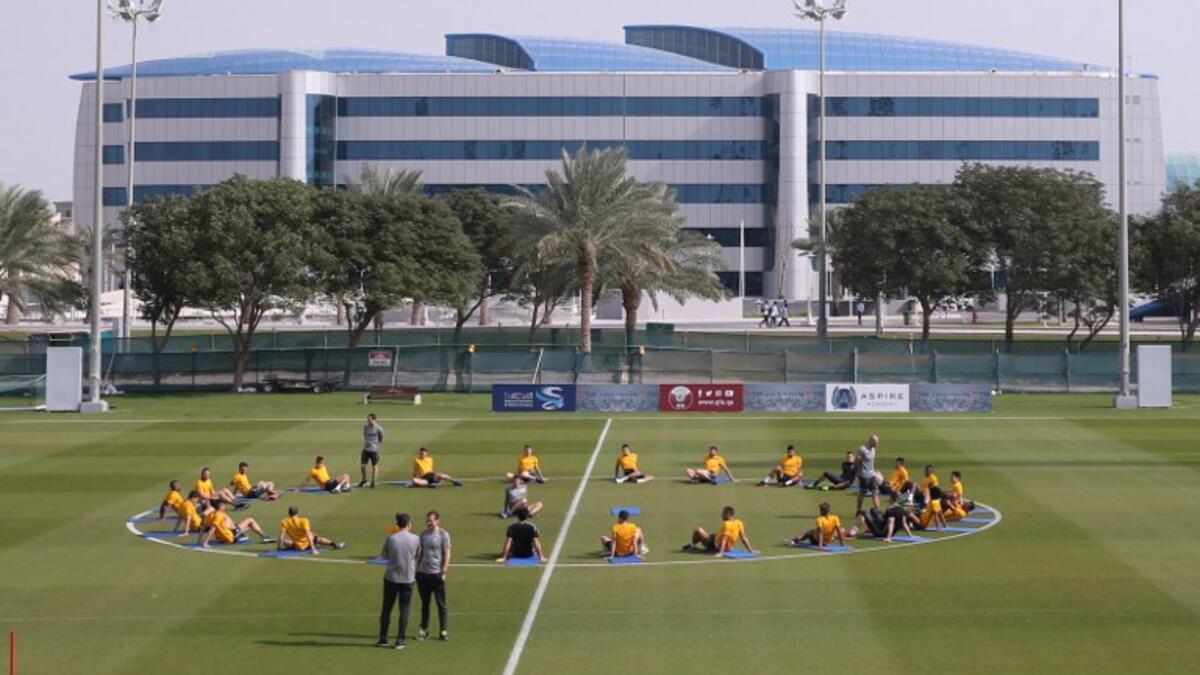 Juventus players attend a training session in Doha on December 21, 2016, two days before the Italian Super Cup final football match between Juventus and AC Milan in the Qatari capital. KARIM JAAFAR / AFP