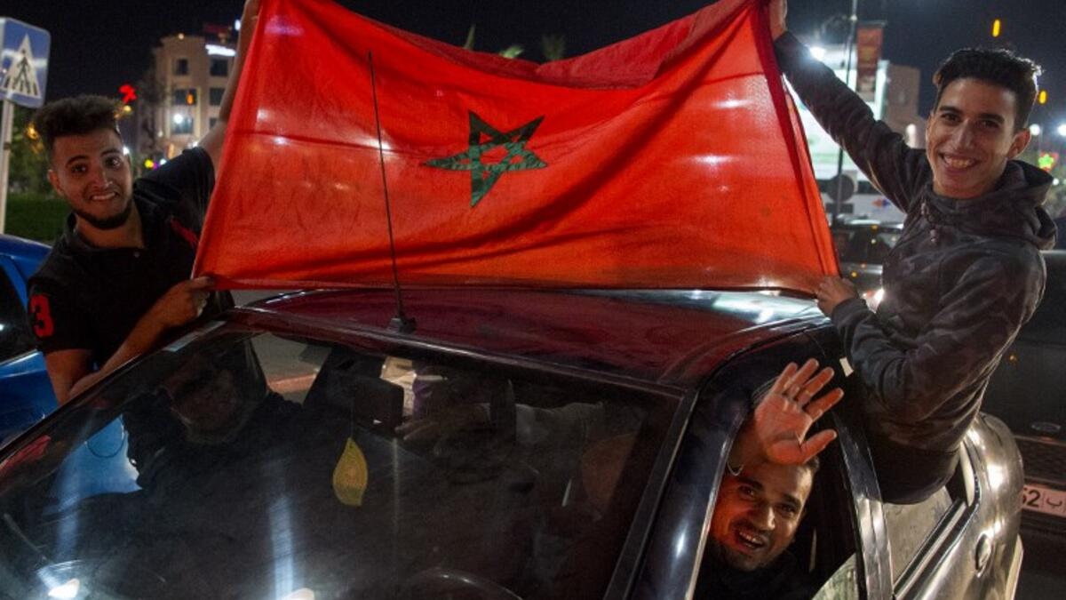 Moroccans celebrate November 11, 2017 in Marrakech following Morocco's victory over Ivory Coast in their FIFA 2018 World Cup Africa Qualifier to participate the FIFA 2018 World Cup.

Fadel SENNA / AFP