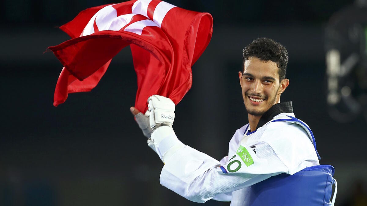 لاعب التايكواندو التونسي أسامة وسلاتي: برونزية وزن 80 كيلوغرام.