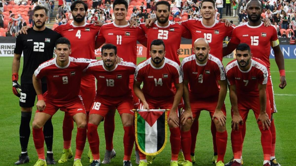Palestine's team pose for a group picture during the 2019 AFC Asian Cup group B football match between Palestine and Jordan at the Mohammed Bin Zayed Stadium in Abu Dhabi on January 15, 2019.
Khaled DESOUKI / AFP