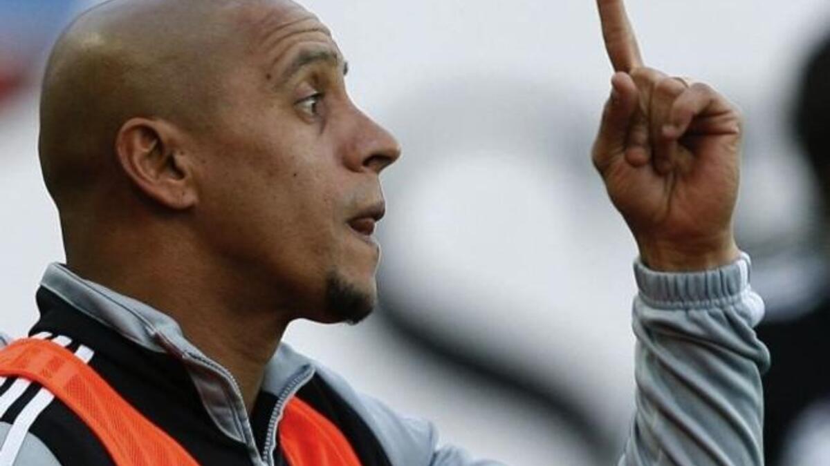 المركز الأول: الظهير البرازيلي روبرتو كارلوس برصيد 11 هدفاً.