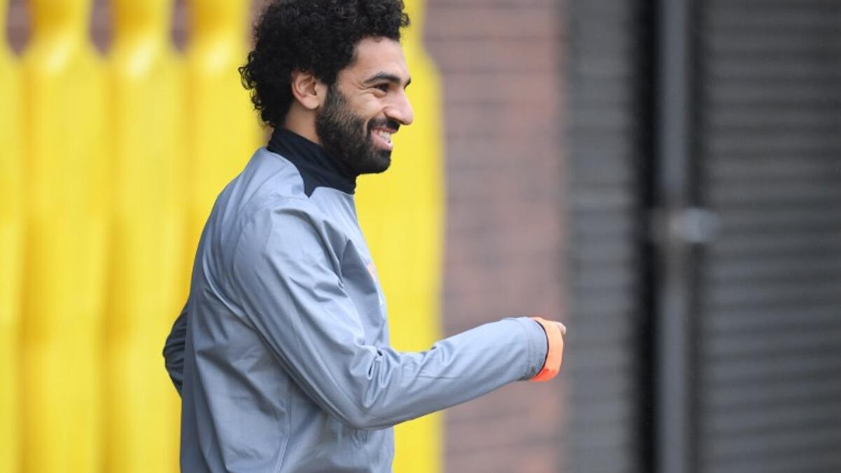 Liverpool's Egyptian midfielder Mohamed Salah arrives for a team training session at the club's Melwood training complex in Liverpool, north west England, on September 25, 2017 , on the eve of their Champions League Group E football match against Spartak Moscow in Russia.
Paul ELLIS / AFP