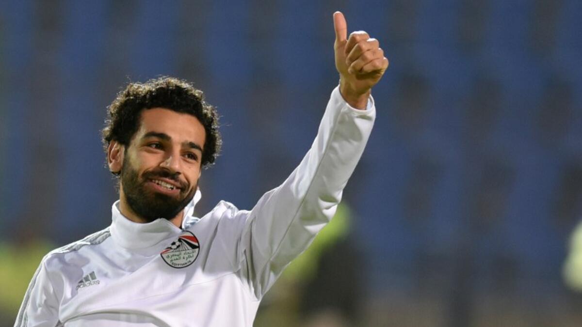 Egypt's Mohamed Salah gestures as he takes part in a training session prior to the international friendly football match between Egypt and Tunisia at the Cairo International Stadium in the Egyptian capital on January 8, 2017.

MOHAMED EL-SHAHED / AFP