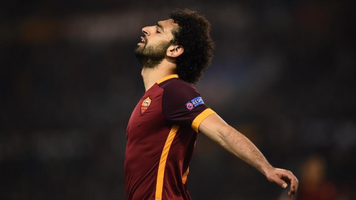 Roma's midfielder from Egypt Mohamed Salah reacts during the UEFA Champions League football match AS Roma vs Real Madrid on Frebruary 17, 2016 at the Olympic stadium in Rome. AFP PHOTO / FILIPPO MONTEFORTE
FILIPPO MONTEFORTE / AFP
