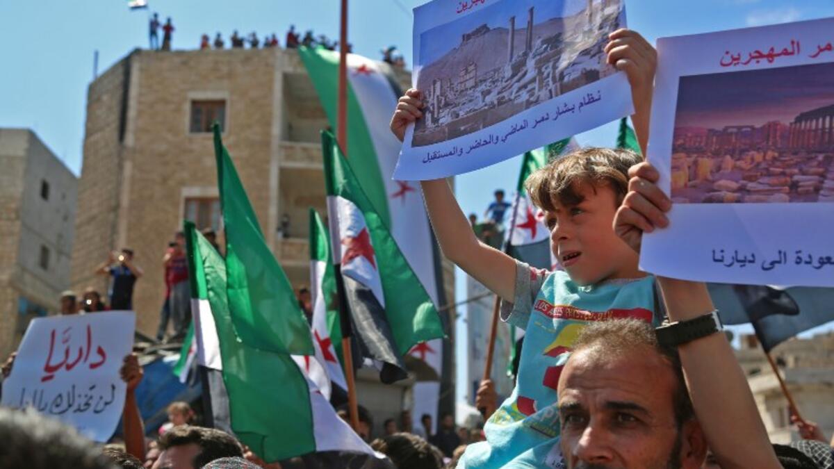 Even little children have participated in the Syrian protests on September 7, 2018. (Zein Al RIFAI / AFP)