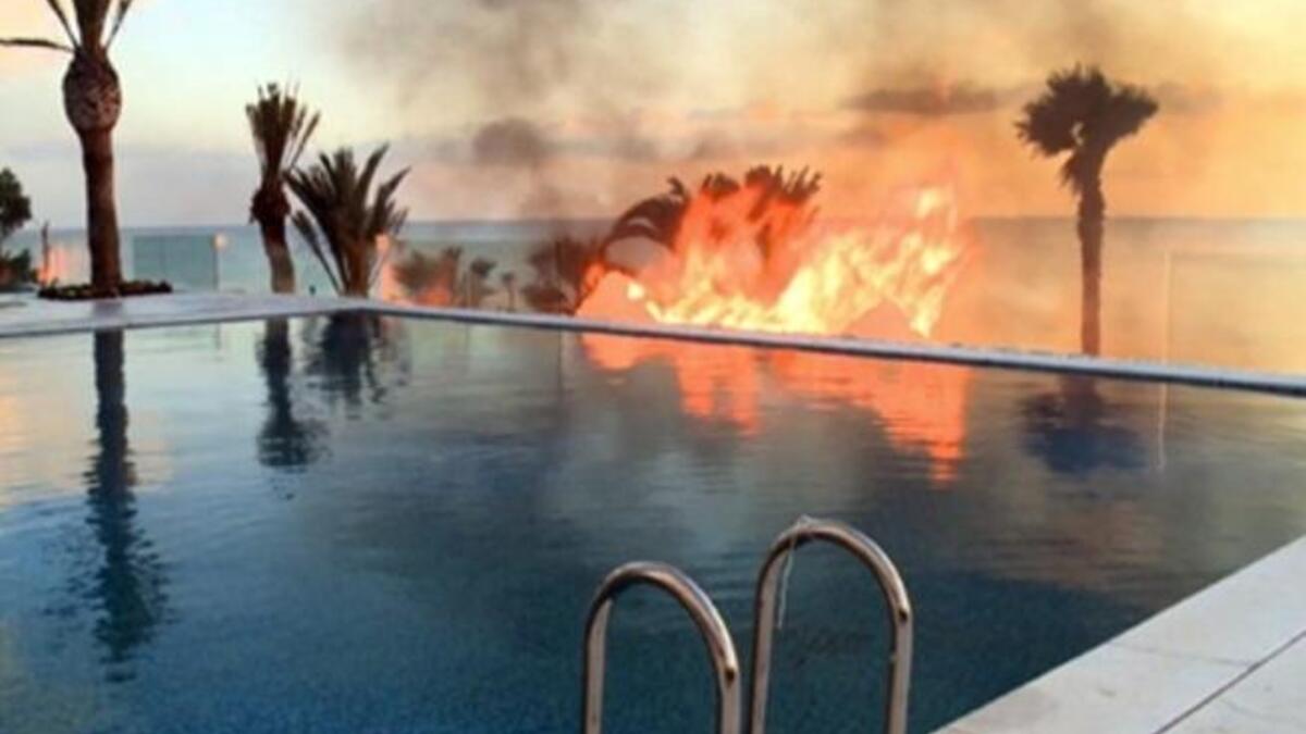 A fire at a residence said to be owned by a member of Tunisian President Ben Ali's inner circle on the sideline of anti-government protests at the chic Mediterranean resort.