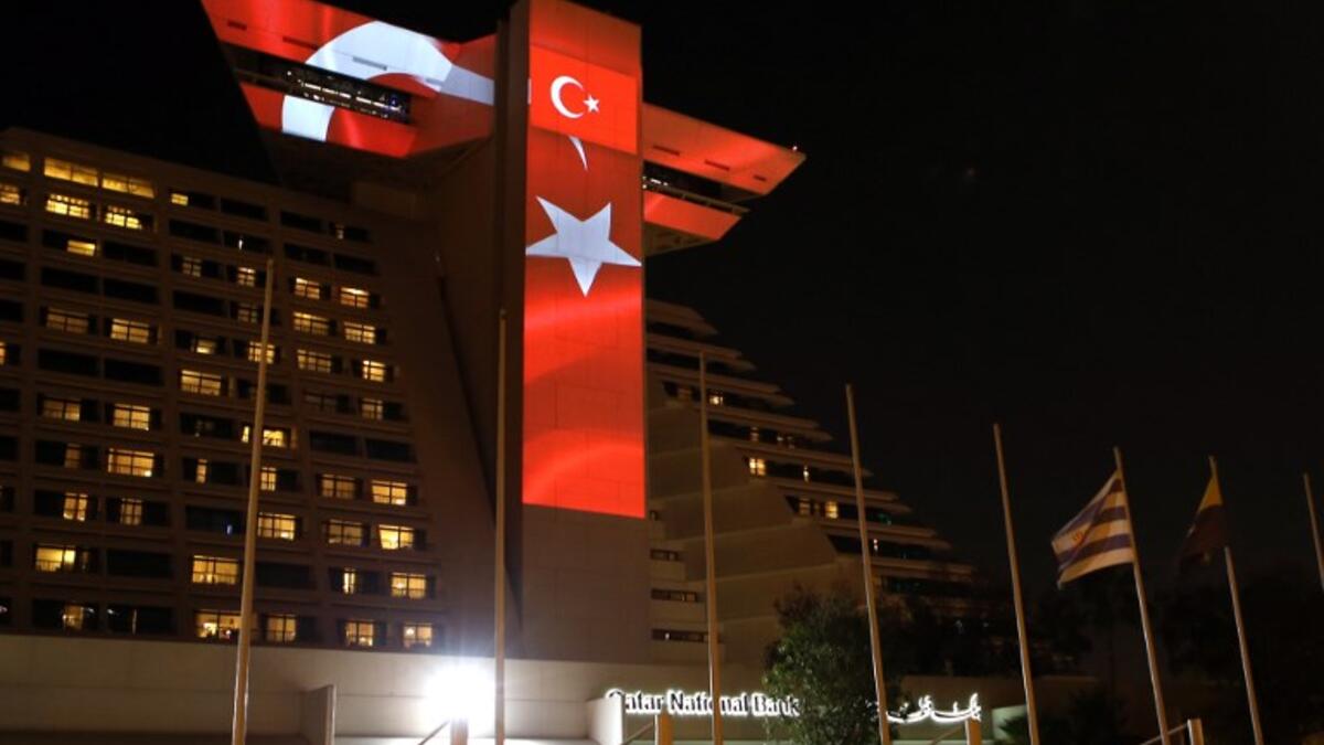This picture taken on June 25, 2018, in Doha, shows the Turkish flag displayed on the Sheraton Doha hotel to celebrate the victory of Turkish President Recep Tayyip Erdogan in the presidential elections in Turkey. (AFP/ File Photo)