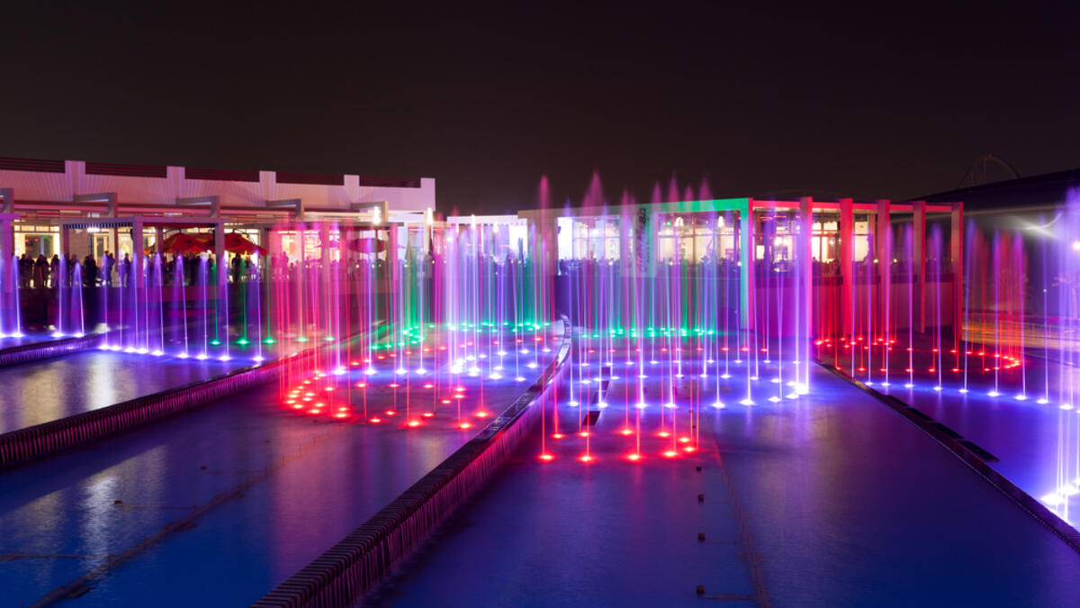 Fountain at the Ferrari World Theme Park illuminated at night. (Shutterstock/ File Photo)