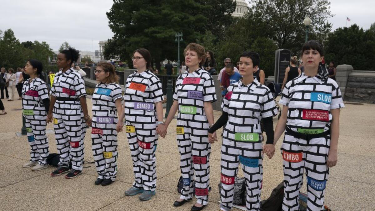 Protesters demonstrate in opposition to the Senate confirmation of Brett Kavanaugh to The Supreme Court in Washington DC, October 6, 2018. (CHRIS KLEPONIS / AFP)