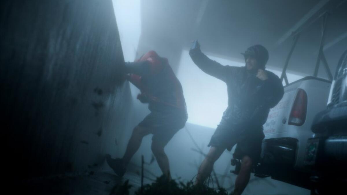 People watch Hurricane Michael October 10, 2018 in Panama City, Florida. Michael slammed into the Florida coast on October 10 as the most powerful storm to hit the southern US state in more than a century. (Brendan Smialowski / AFP)