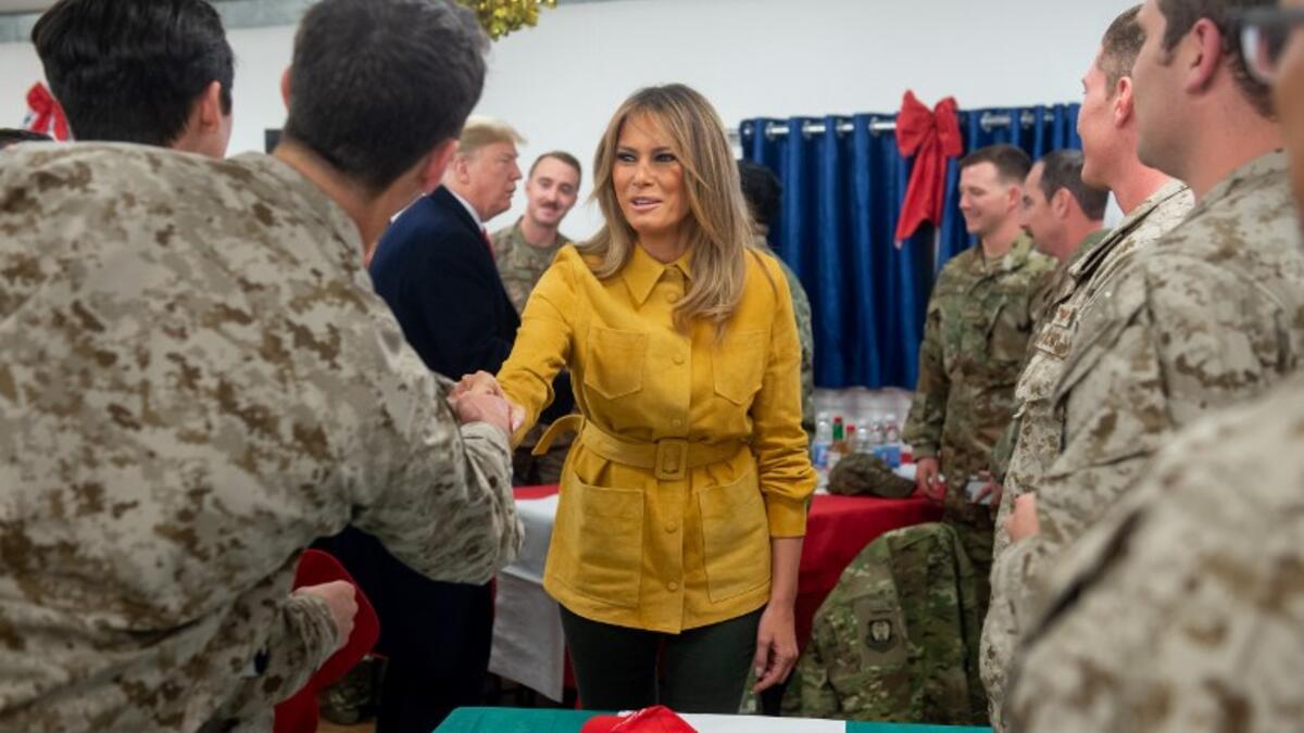 US First Lady Melania Trump greet members of the US military during an unannounced trip to Al Asad Air Base in Iraq on December 26, 2018.
SAUL LOEB / AFP