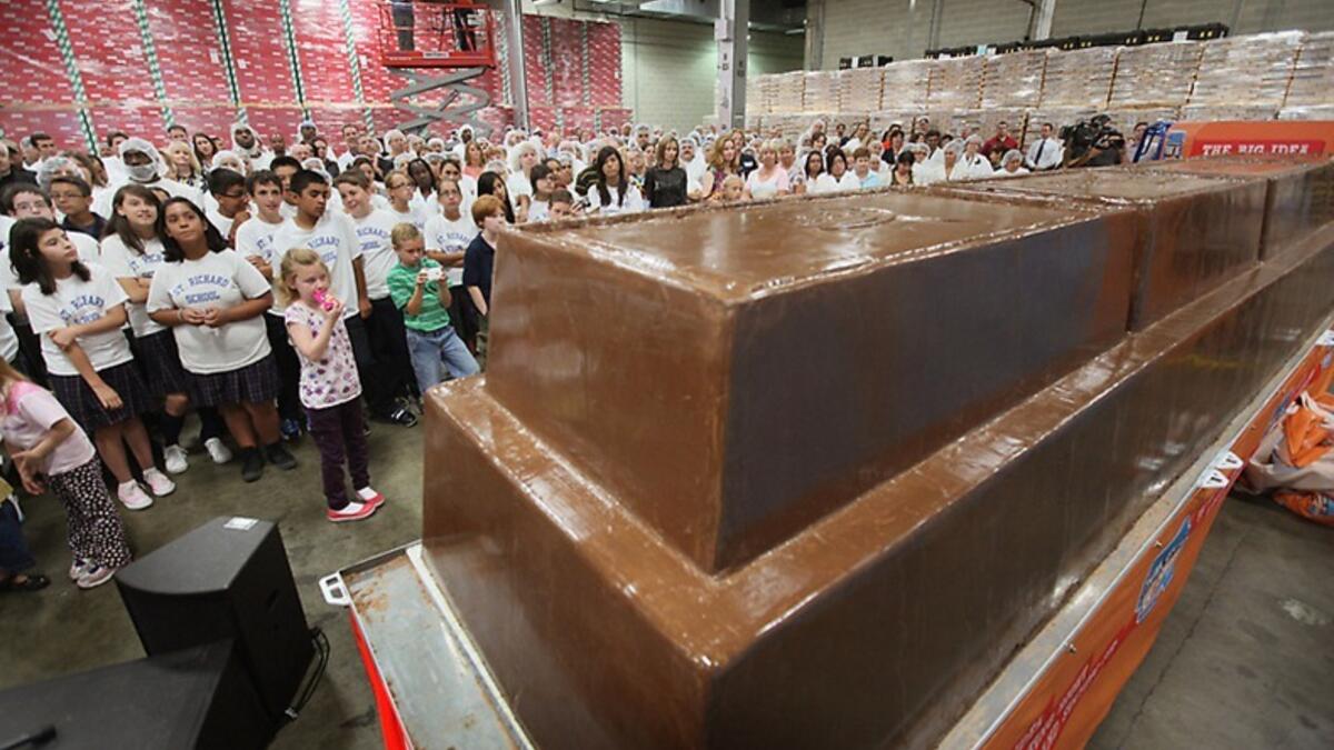 The bar, which stands nearly 3 feet high and measures 21 feet long, weighs 12,290 pound beating the previous record chocolate bar by more than a ton. (amusingplanet.com)