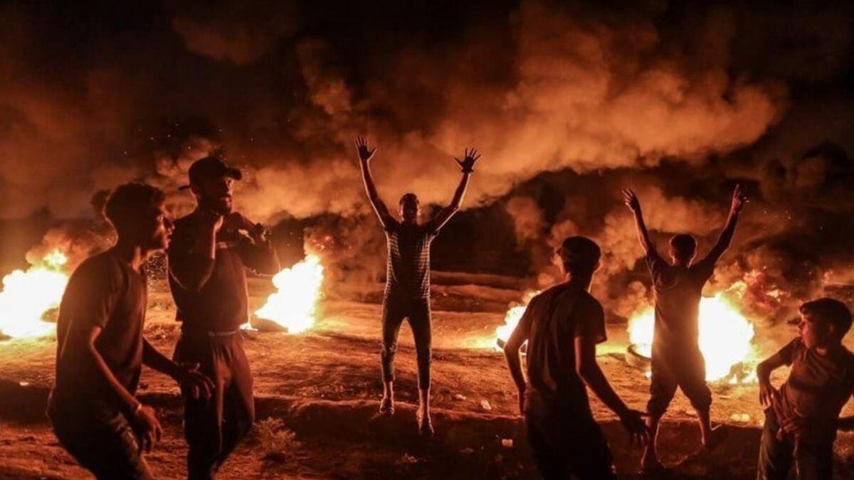 A Palestinian protesters from a group calling themselves the "night confusion units" (proxy1.baaz/A.Al-KahiOut)