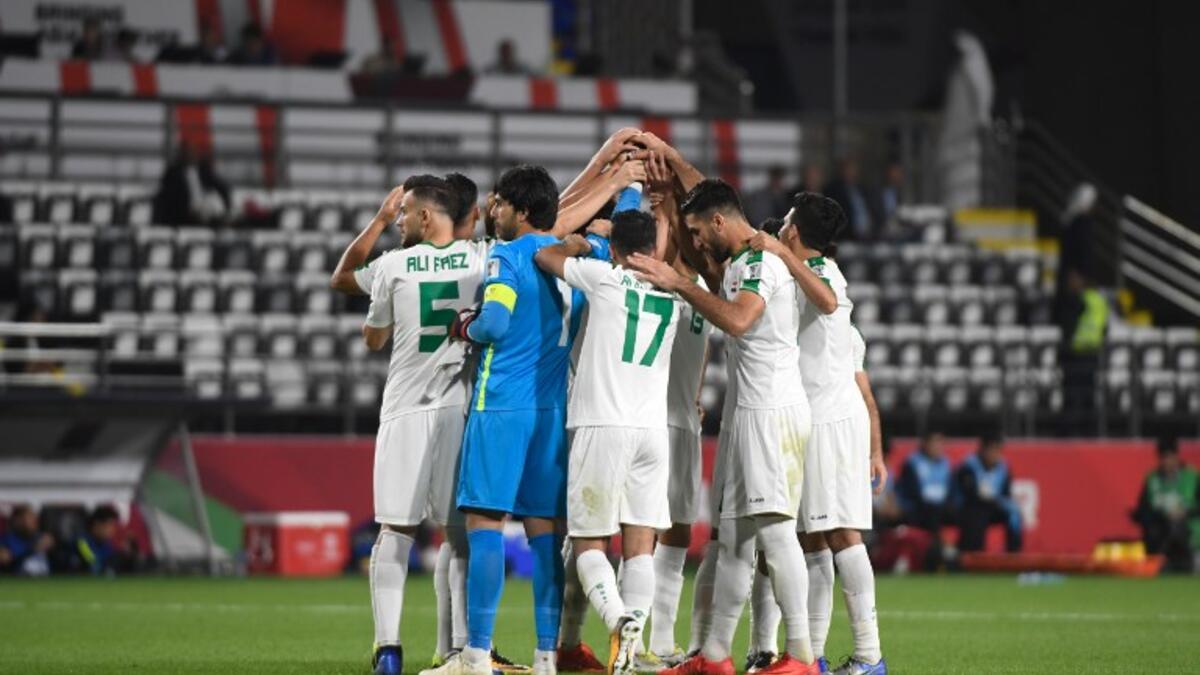 Iraq's players gather in a huddle ahead of during the 2019 AFC Asian Cup Round of 16 football match between Qatar and Iraq at the Al Nahyan Stadium in Abu Dhabi on January 22, 2019.
Khaled DESOUKI / AFP
