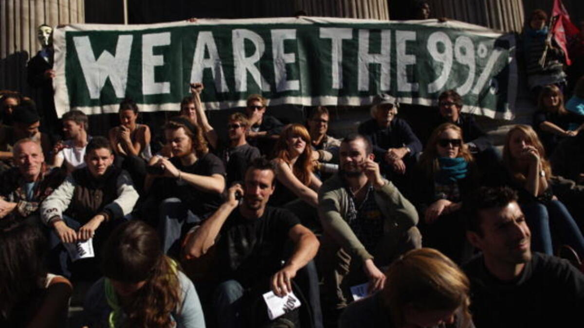 Occupy London's Stock Exchange: headlined the UK's continental effort in a bout of peaceful protest
near St. Paul's this weekend. This assembly of happy campers marked the more familiar British spirit of
Wimbledon-style overnight queuing, as people expressed that this was civil disobedience, not protest. 
A far cry from London's Summer fire.