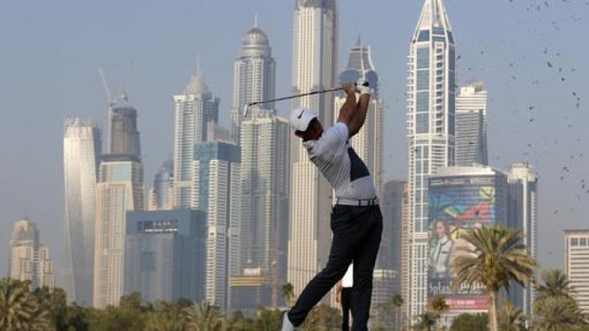Rory McIlroy of Northern Ireland plays his third shot during the first round of the 2016 Dubai Desert Classic at the Emirates Golf Club on February 4, 2016 in Dubai.