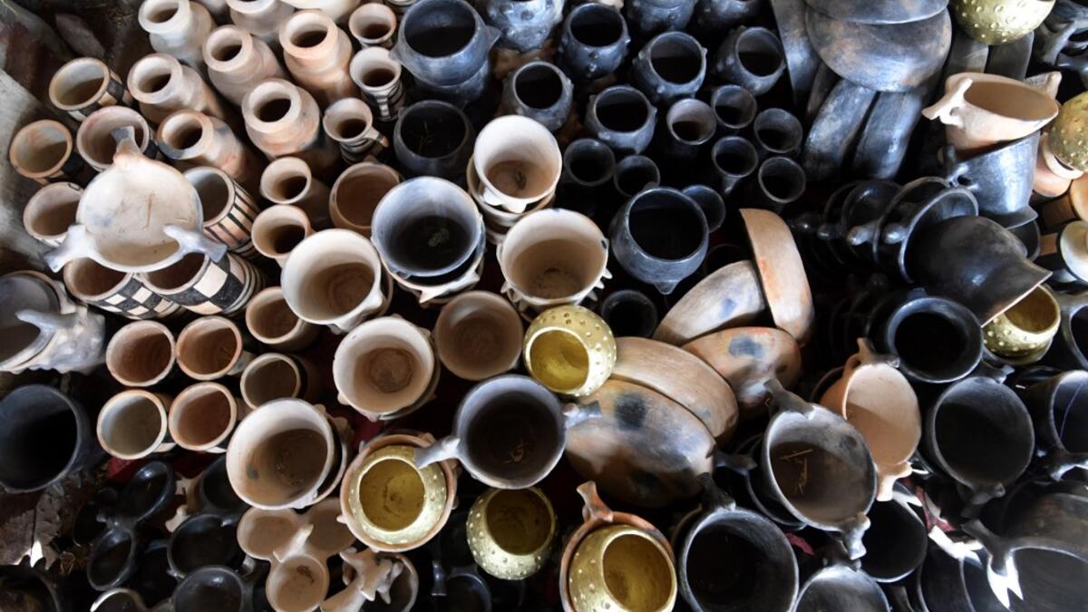 Some of the works of Sabiha Ayari, a Tunisian potter in her fifties, are displayed in the village of Sejnane in the northern Tunisian. FETHI BELAID / AFP