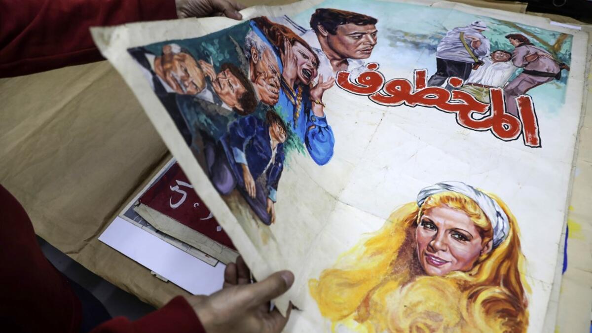 In a Beirut cultural centre, Lebanese film buff Abboudi Abu Jawdeh is exhibiting vintage film posters from his collection that show off a lost art, but also offer insight into decades of Western cliches of the Arab world. JOSEPH EID / AFP