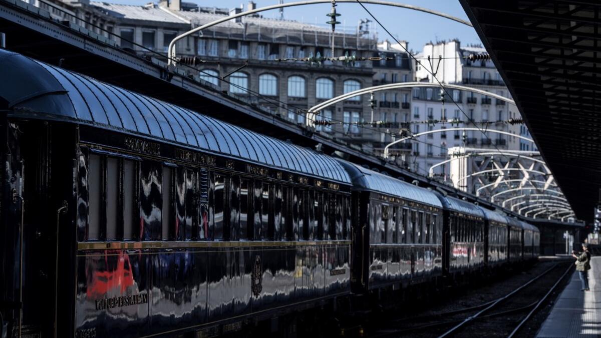 This picture taken on May 13, 2019 shows a restored Orient Express train displayed at the Gare de l'Est train station in Paris.  Christophe ARCHAMBAULT / AFP