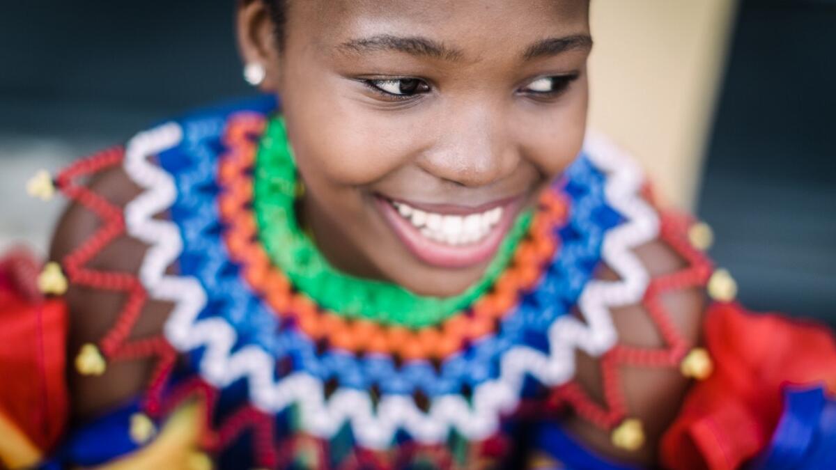 A young woman dressed up in traditional attire takes part in an audition organised by the Indoni Culture School in the South African city of Durban. Rajesh JANTILAL / AFP