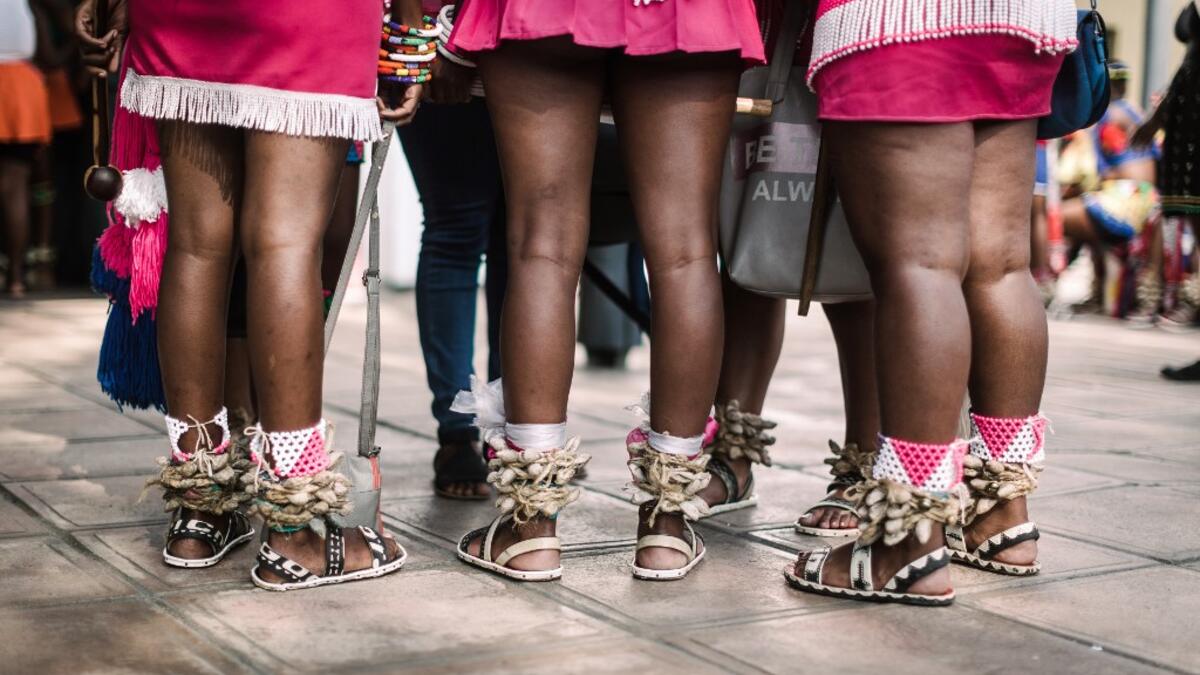 Young women dressed up in traditional attire gather before taking part in auditions organised by the Indoni Culture School in the South African city of Durban. Rajesh JANTILAL / AFP