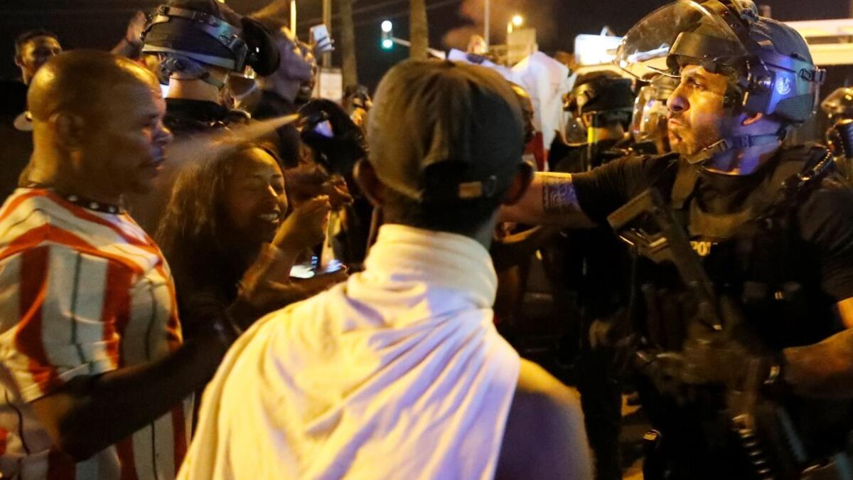 Angry protesters clashed with Israeli police over an off-duty officer's killing of a young man of Ethiopian origin, as the incident drew fresh accusations of racism. JACK GUEZ / AFP