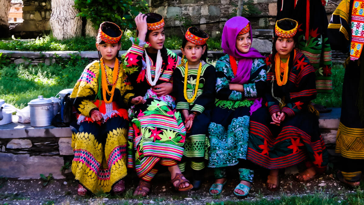 Portrait of Kalash tribe woman in national costume at Joshi fest (Shutterstock)