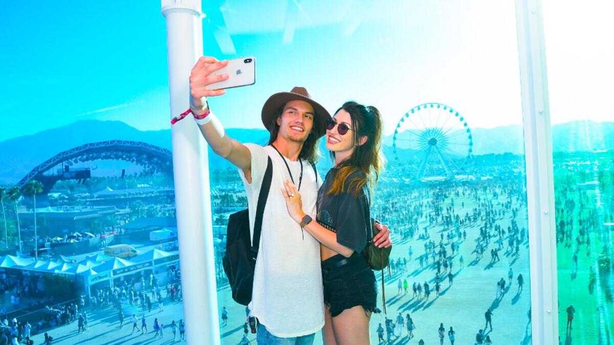 Festival goers attend the 2019 Coachella Valley Music And Arts Festival - Weekend 2 on April 21, 2019 in Indio, California. Presley Ann/Getty Images for Coachella/AFP