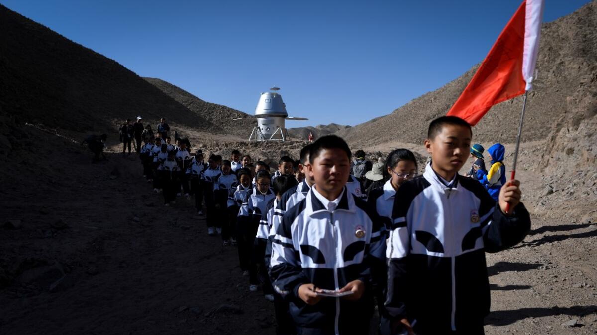 Surrounded by barren hills in northwest Gansu province, "Mars Base 1" opened to the public on April 17 with the aim of exposing teens -- and soon tourists -- to what life could be like on the planet. WANG ZHAO / AFP