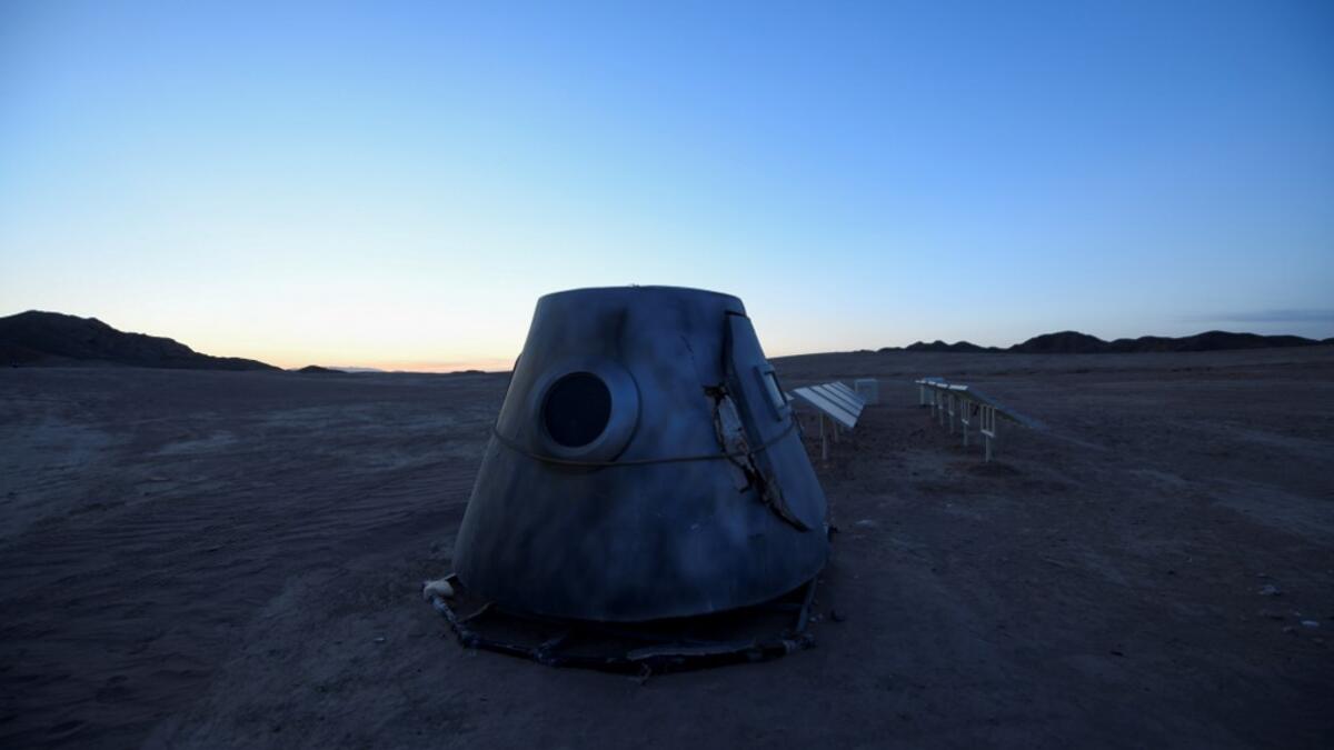 Surrounded by barren hills in northwest Gansu province, "Mars Base 1" opened to the public on April 17 with the aim of exposing teens -- and soon tourists -- to what life could be like on the planet. WANG ZHAO / AFP