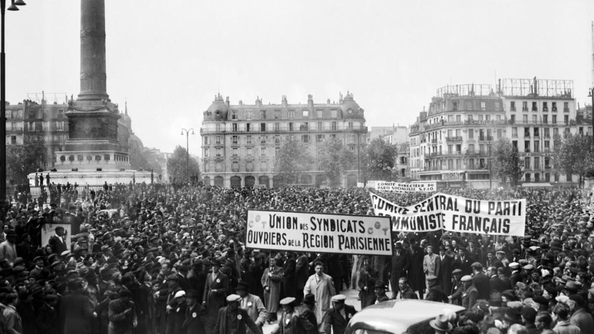 Members of the Central Committee of the French Communist Party and of General Workers' Confederation parade during the May Day protests, on May 01, 1945 on the Place de la Bastille in Paris.  AFP