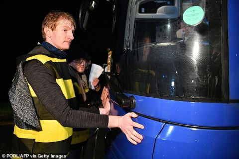 Climate Activists Glue Their Hands to Boris Johnson's Campaign Bus