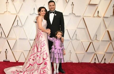 At The Oscars: Syrian Filmmaker Shows off in Arabic Calligraphy Dress 